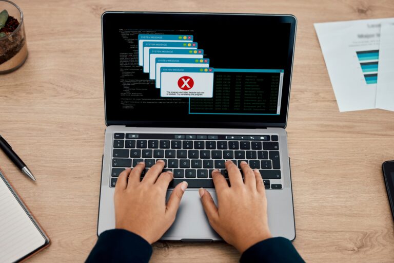 Error, office and hands typing on a laptop working on a web development or design with a mistake. T